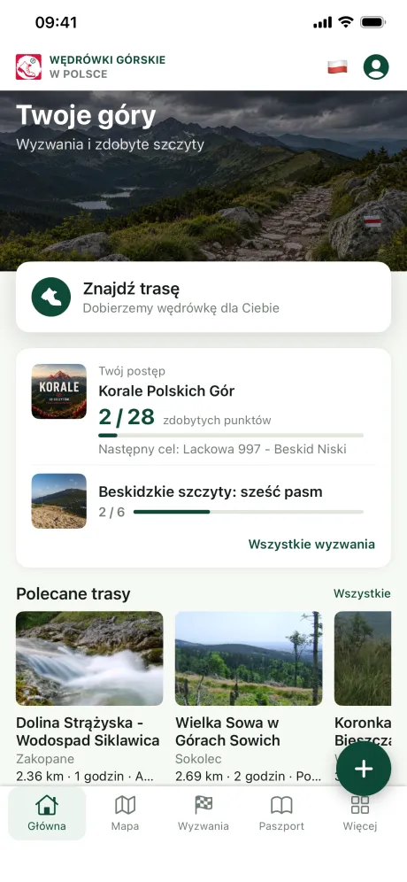 Ekran główny aplikacji z postępem wyzwań i polecanymi trasami